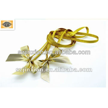 Gold elastic packing gift bow